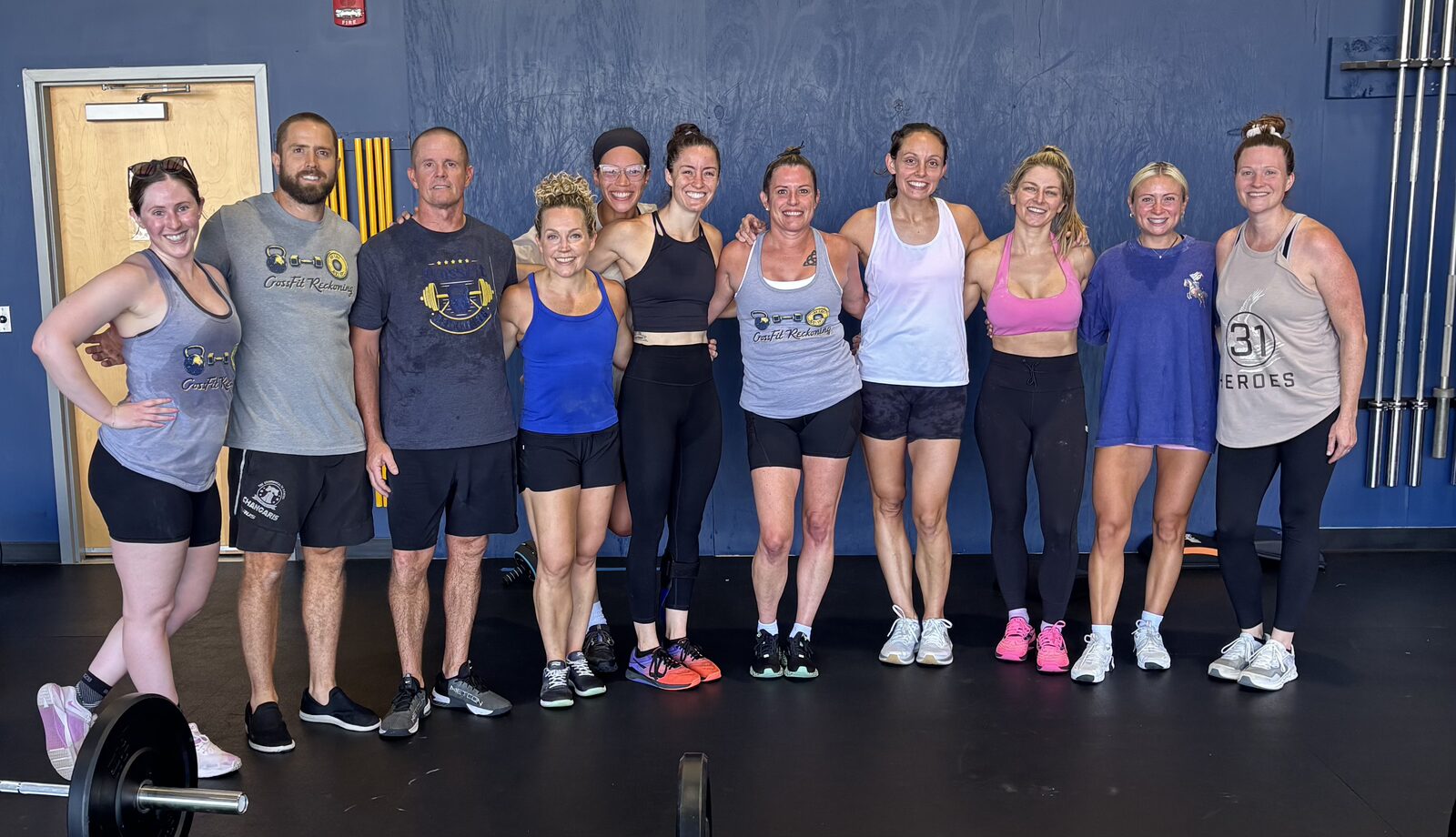 Smiling group of members at CrossFit Reckoning